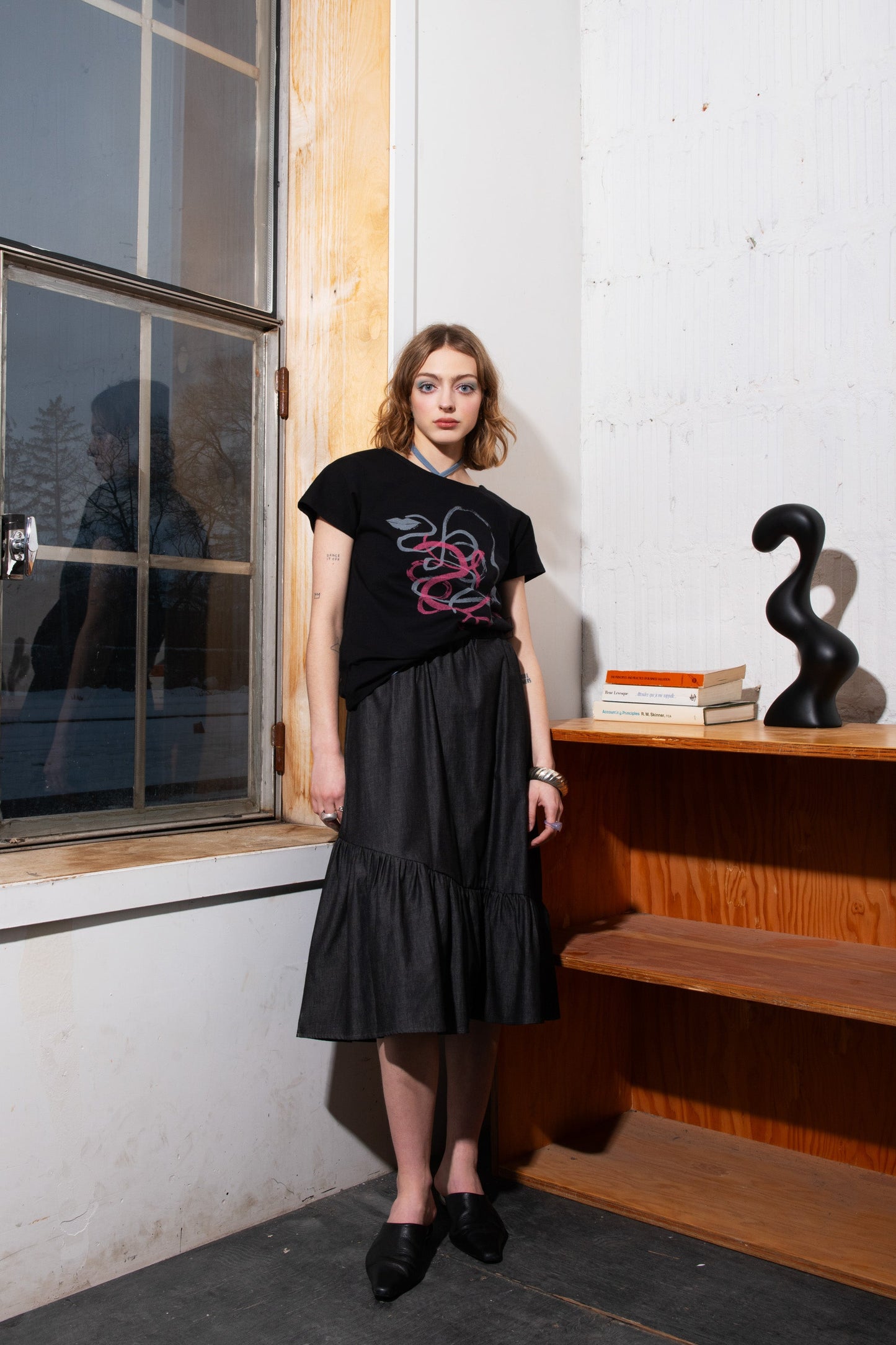 Ruffled black denim skirt Aporià