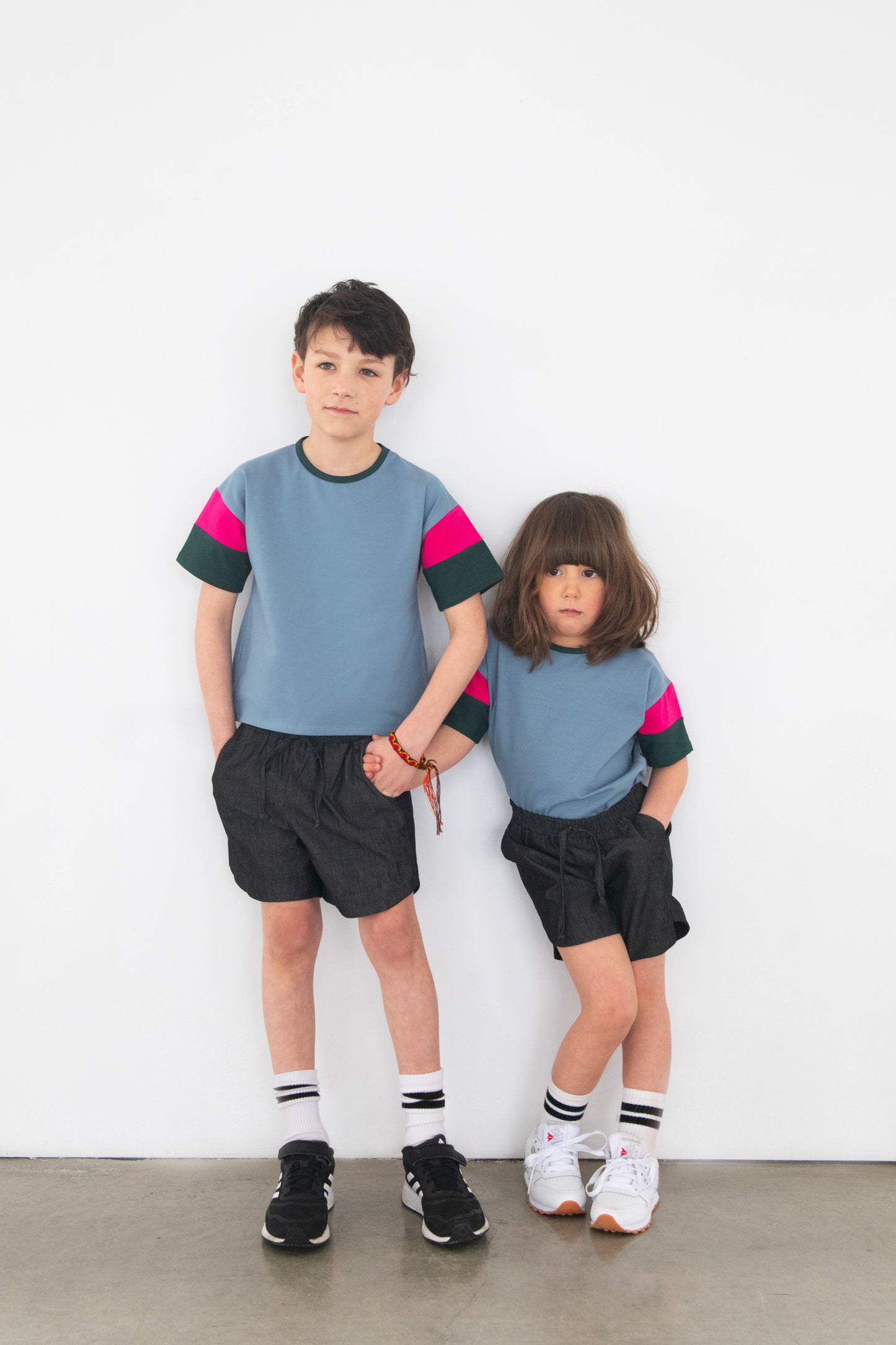 Blue children's T-shirt with cut-out