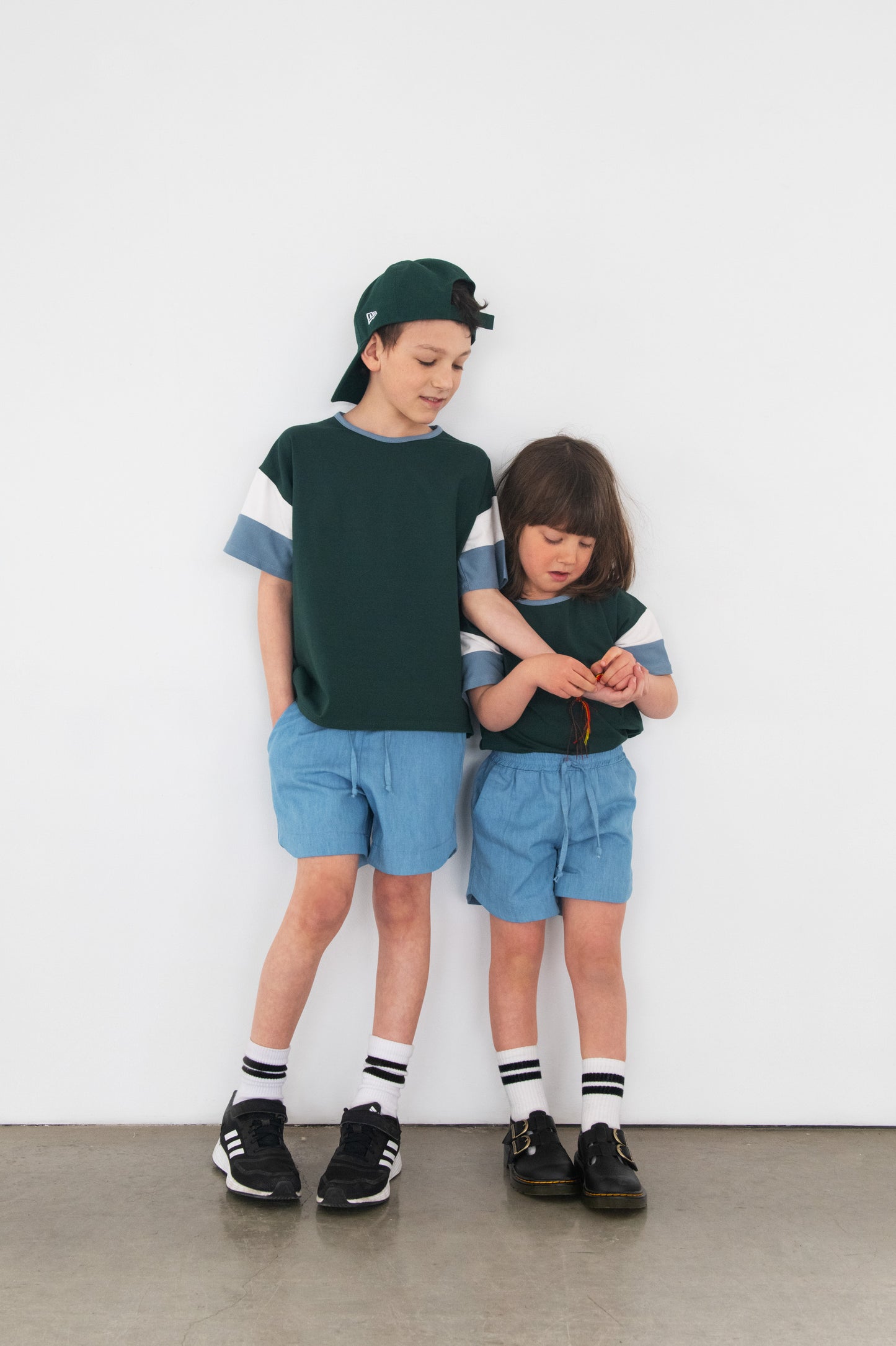 Green children's T-shirt with cut-out