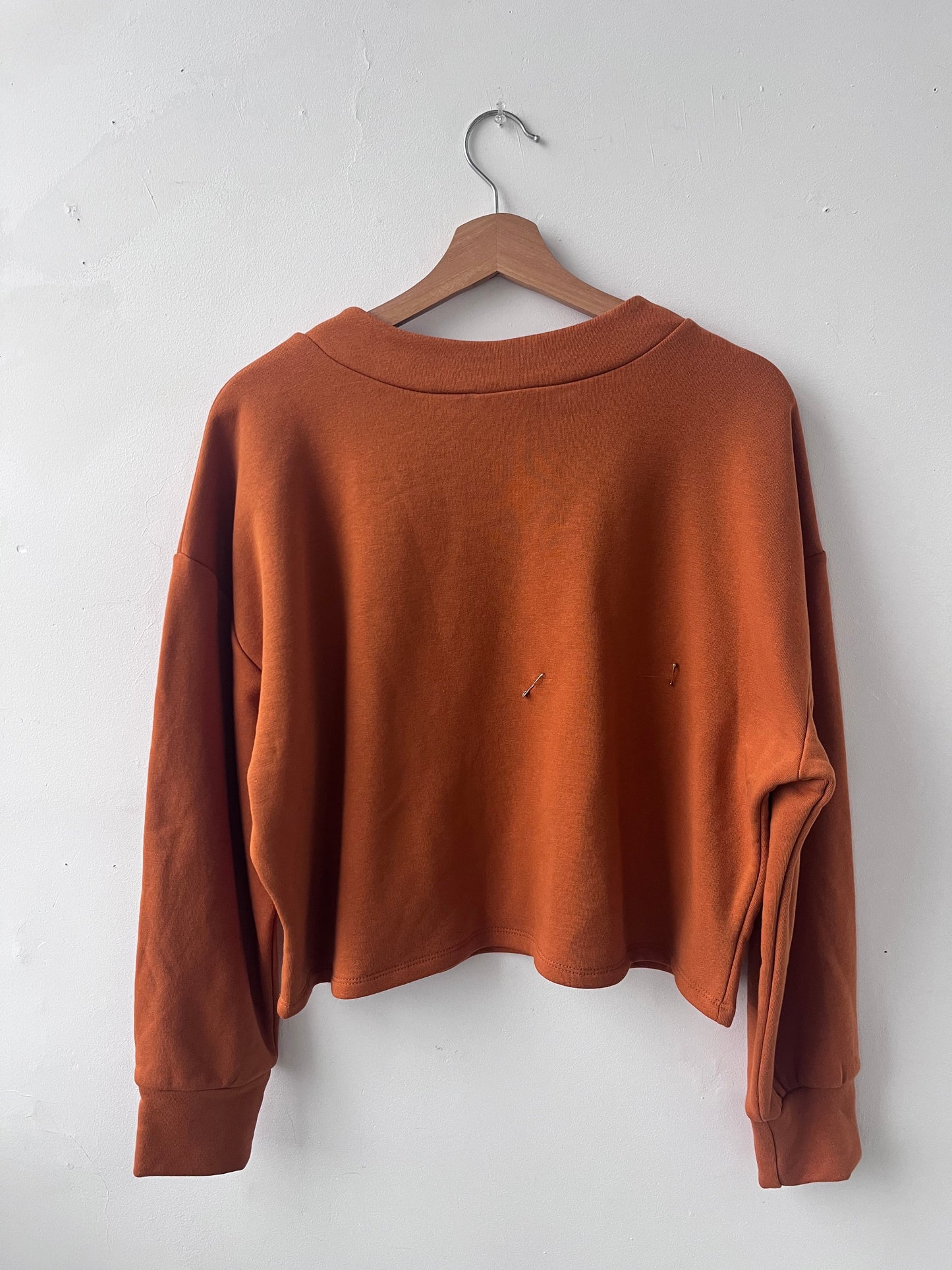 Chandail molletonné orange brûlé L DEFECT